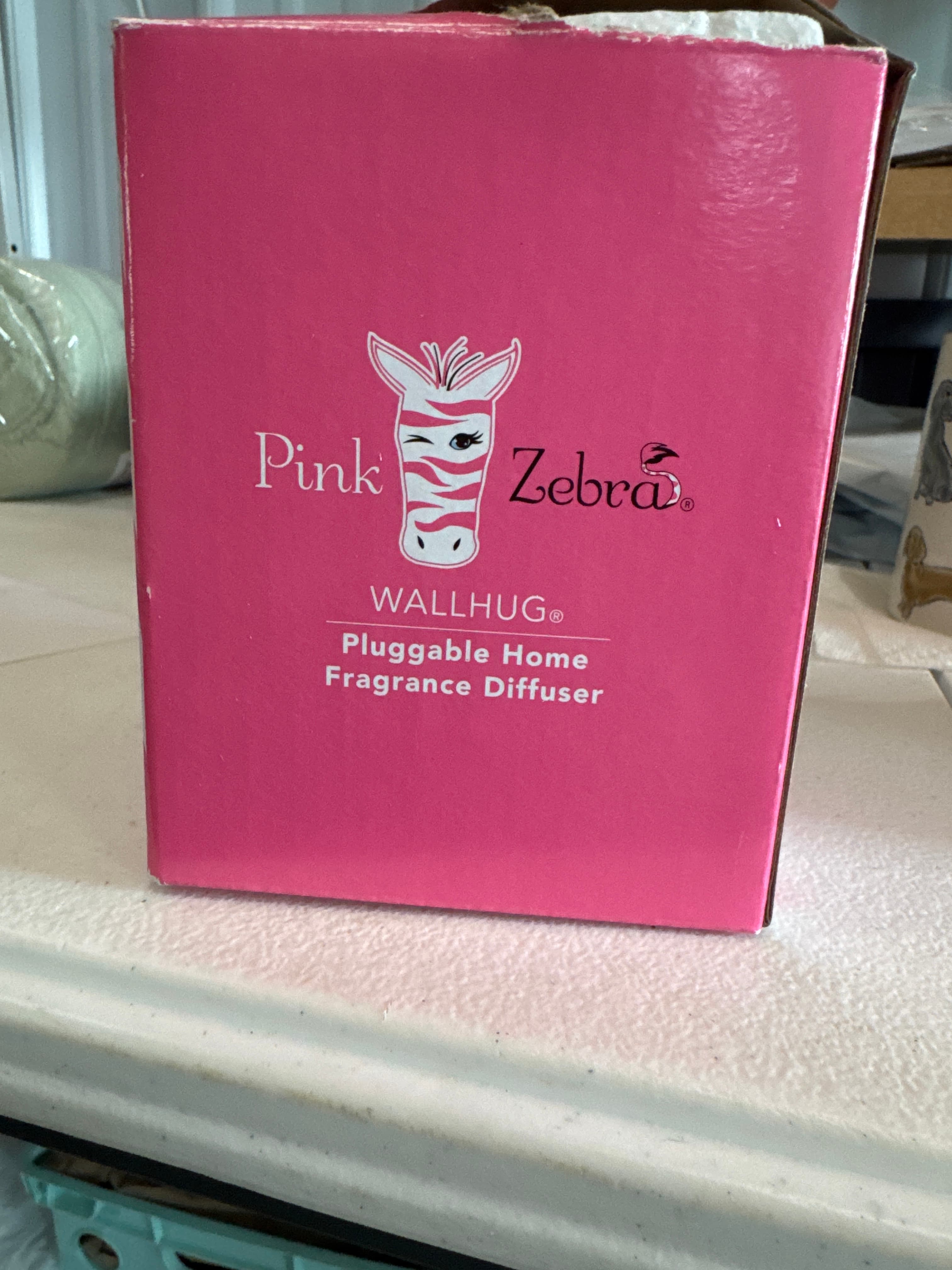 Pink zebra wall hug, pluggable home fragrance diffuser