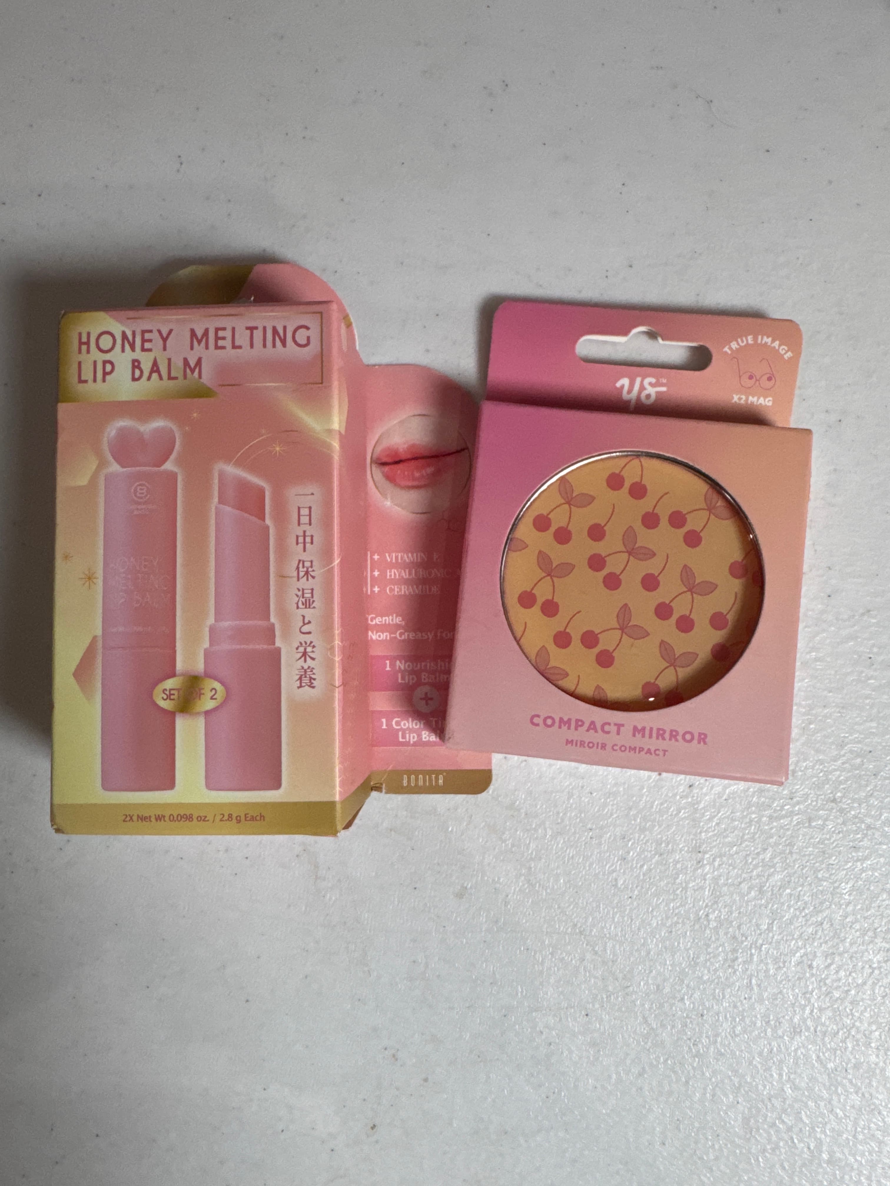 2 pack honey melting lip balm, and a compact mirror combo